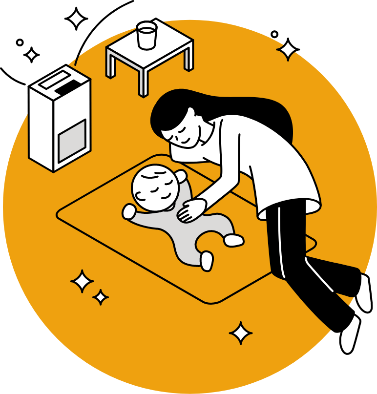 赤ちゃんを寝かせつけている女性